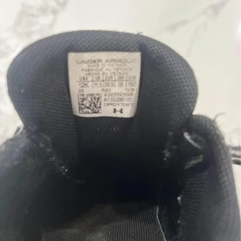 12K Shoes Sneakers black silver some wear toddler Under Armour tennis shoes